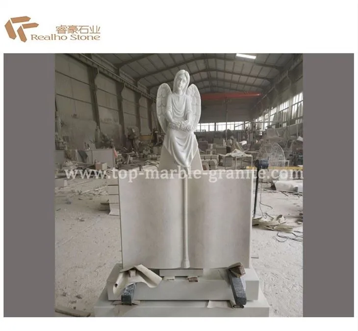 monument hand and book